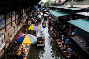people on boats in Bangkok, Thailand