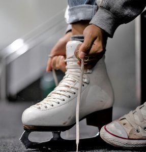 a person wearing ice skate