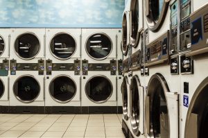washing machines and dryers in a laundromat