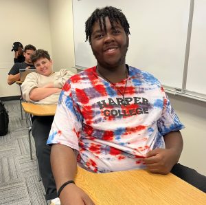 FYS student wearing a brightly-colored shirt created at a campus event