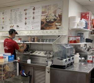 students working at an ice cream parlor